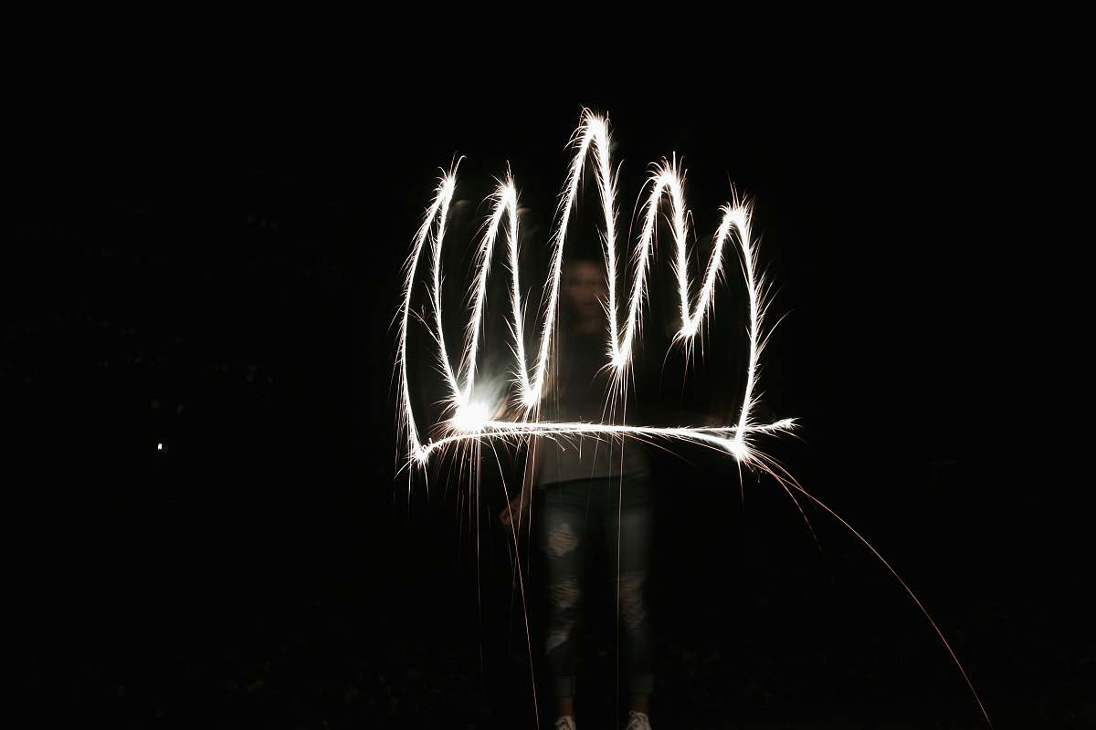 night person holding fireworks outdoors