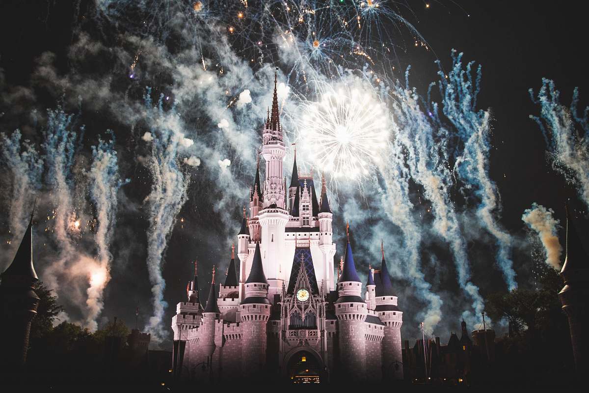 night white castle with fireworks disney
