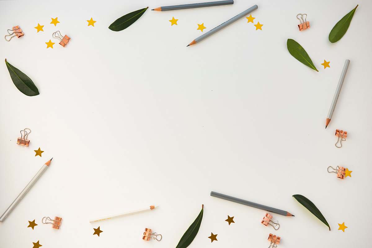 brown pencils on white panel desk