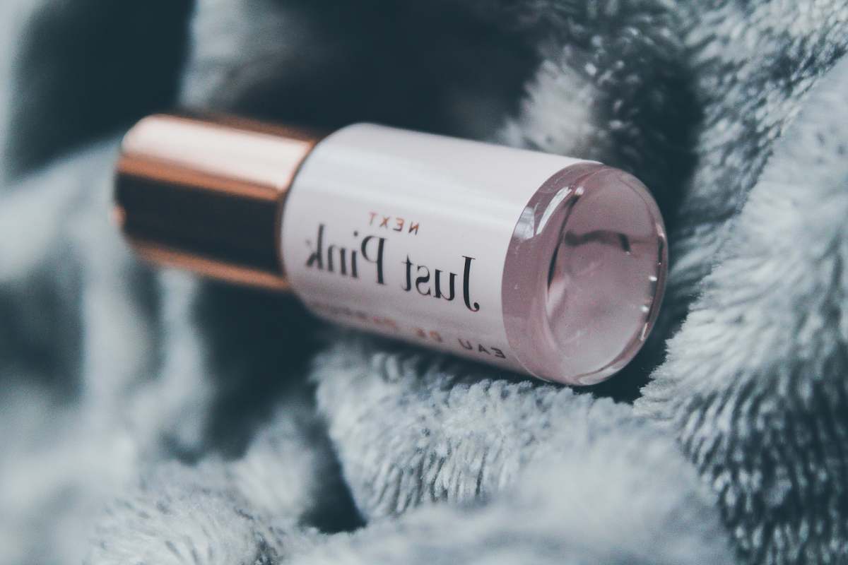 grey closeup photography of Next Just Pink bottle lipstick