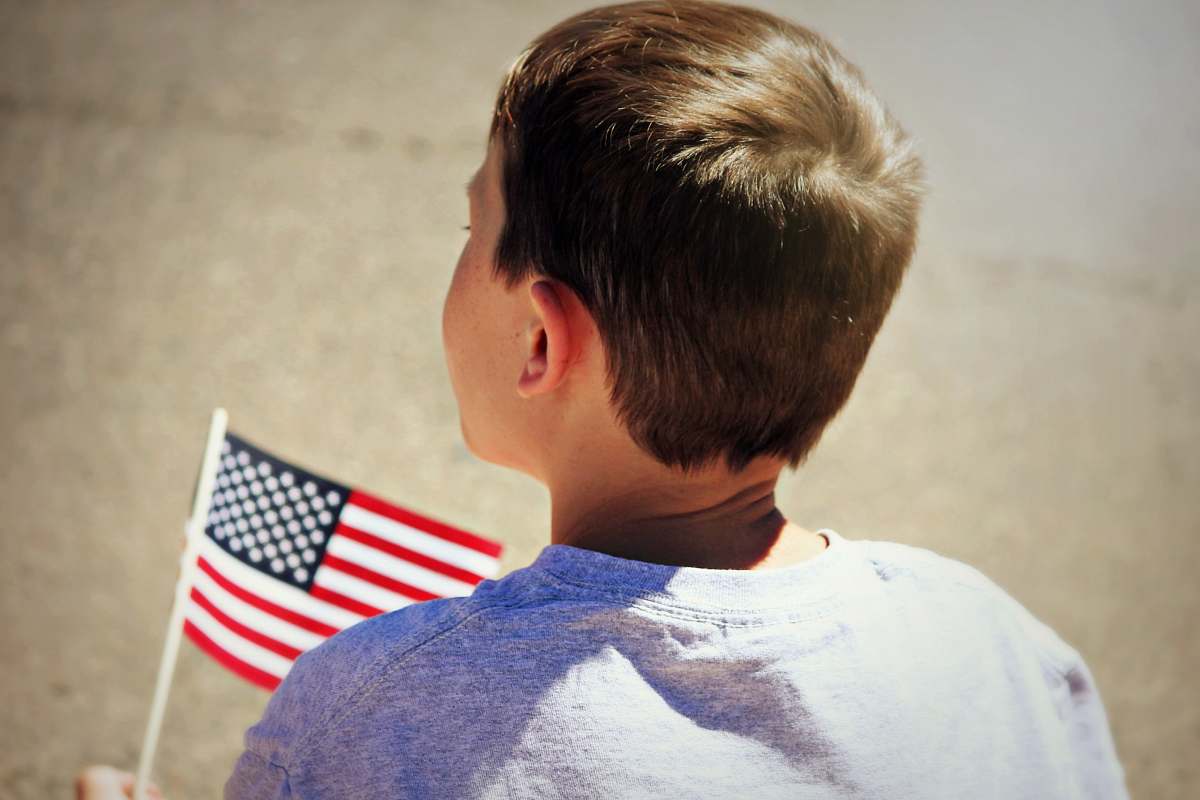 symbol boy holding American flag human