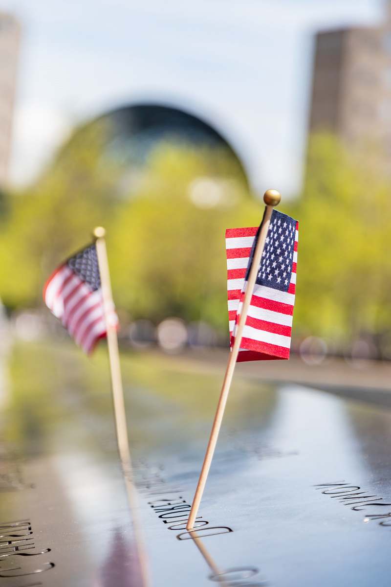 symbol two USA flaglets during daytime american flag