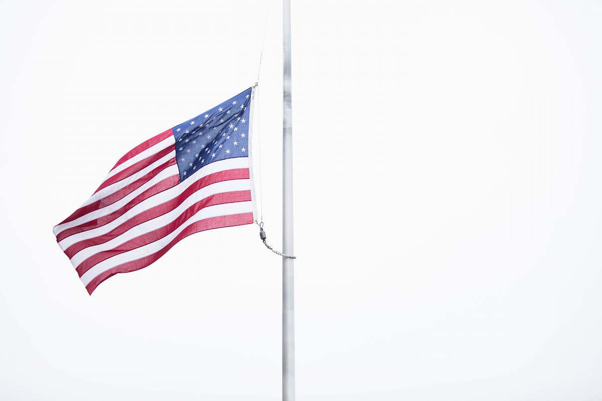 symbol USA flag on grey metal pole american flag