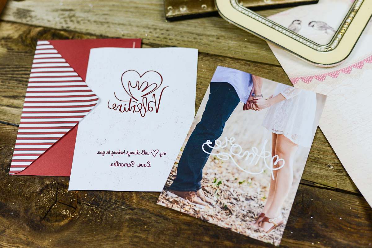 human valentines cards on wooden table denver