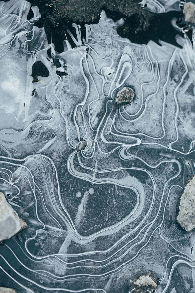 pattern aerial view photography of body of water ice