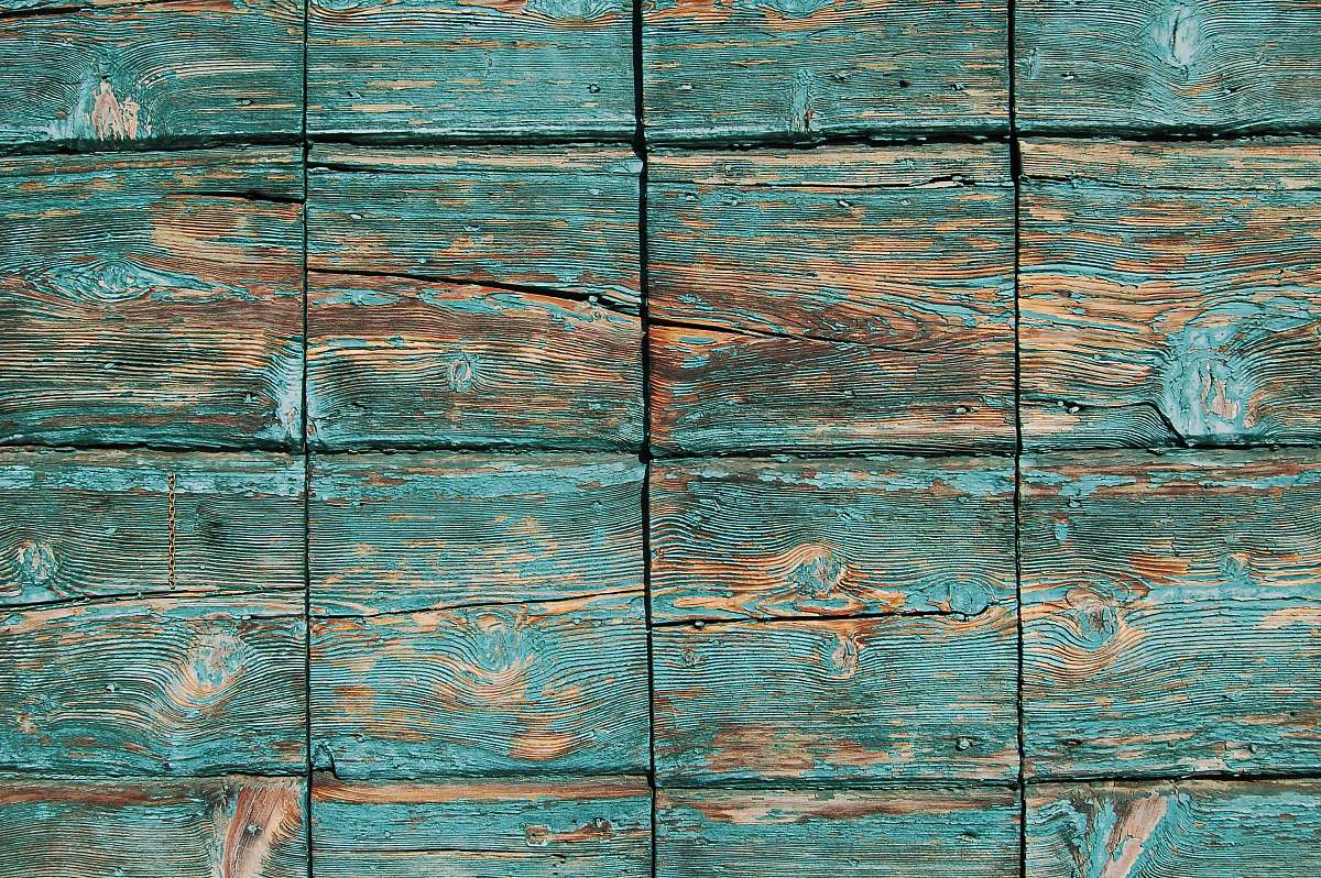 background Turquoise paint coming off square wooden planks pattern