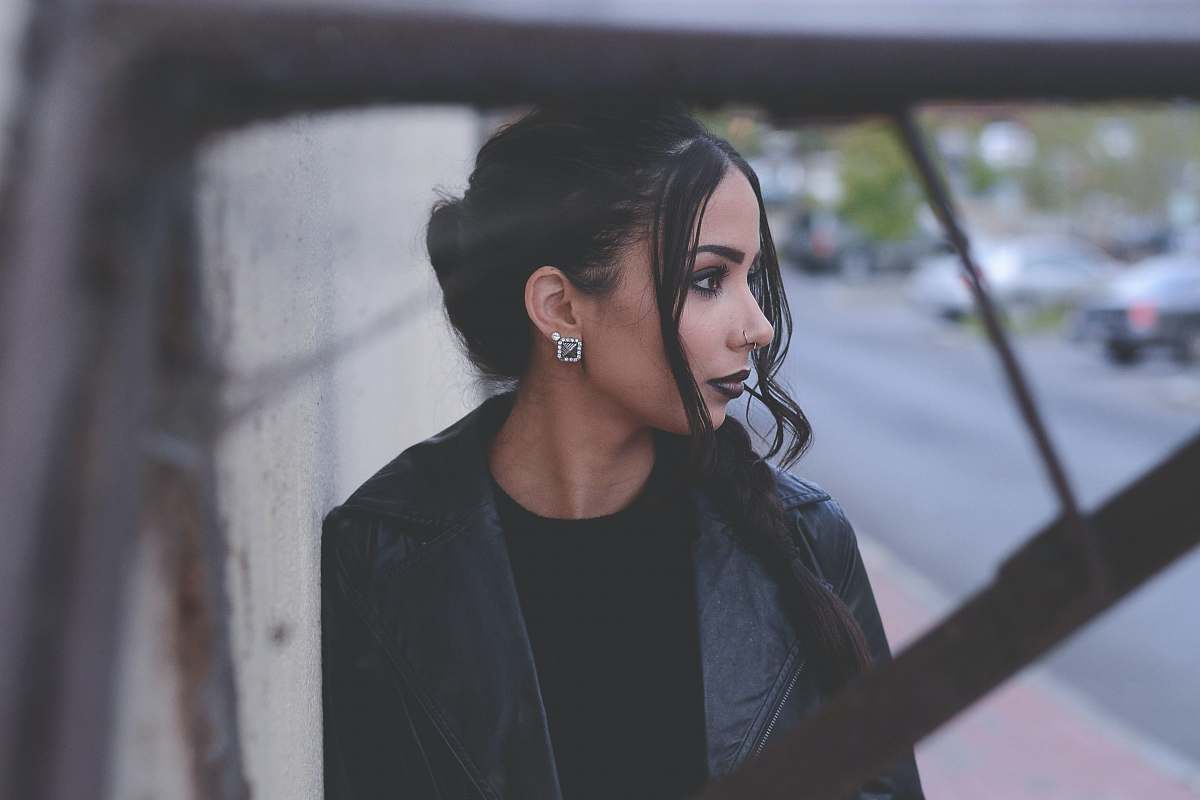 human woman wearing black notched lapel top woman