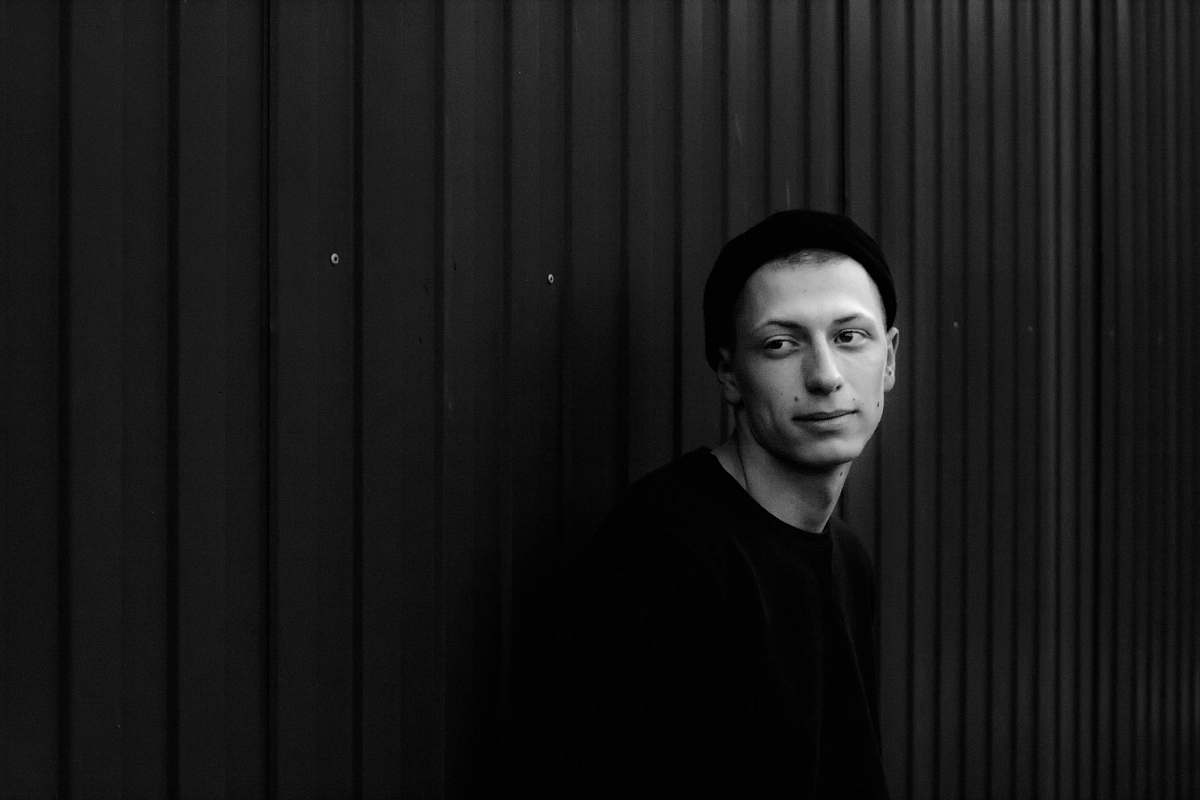 person grayscale photo of man human