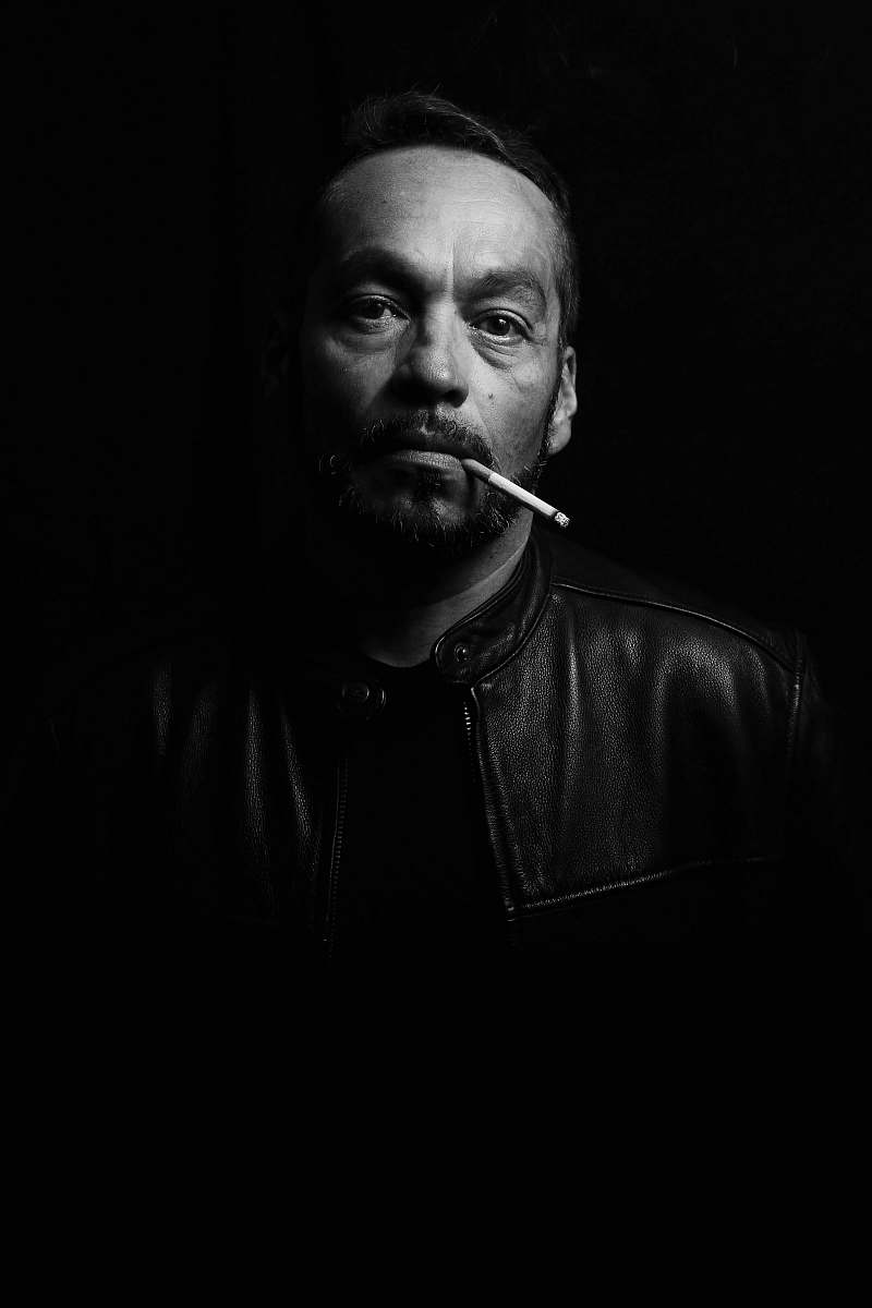 person man wearing black leather jacket black-and-white
