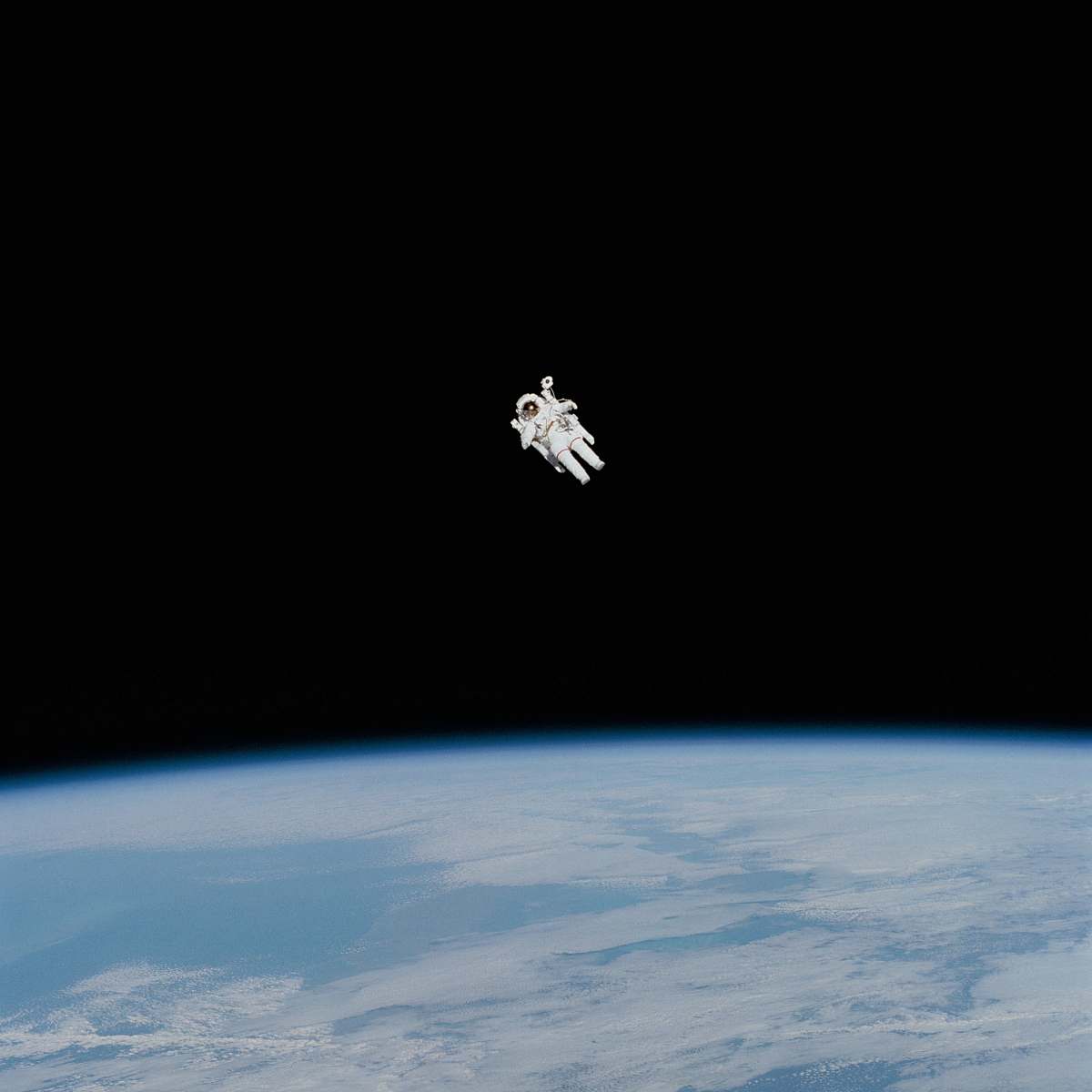 space astronaut in spacesuit floating in space universe