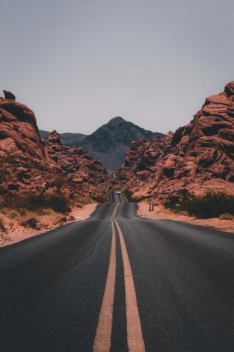 wallpapers black concrete road surrounded by brown rocks road