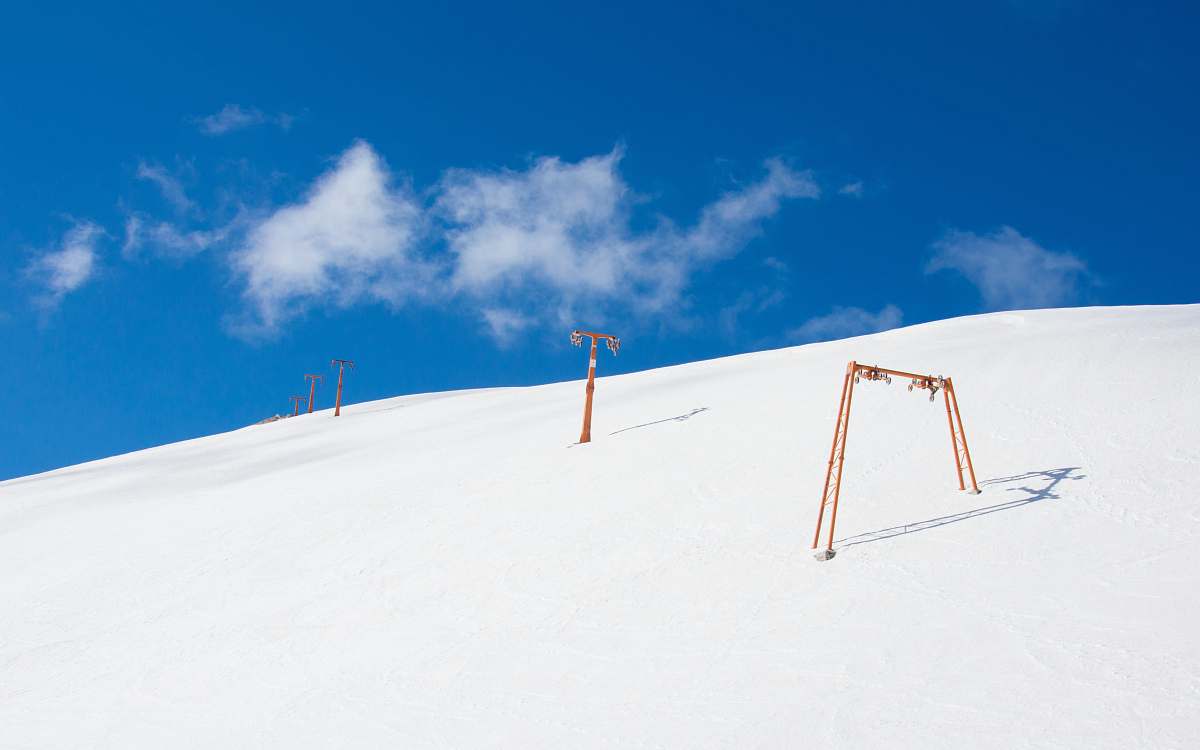 italy snow mountain with orange pole winter