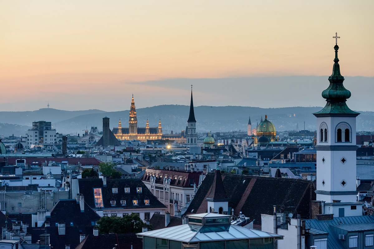 architecture aerial view of a city during sunset steeple