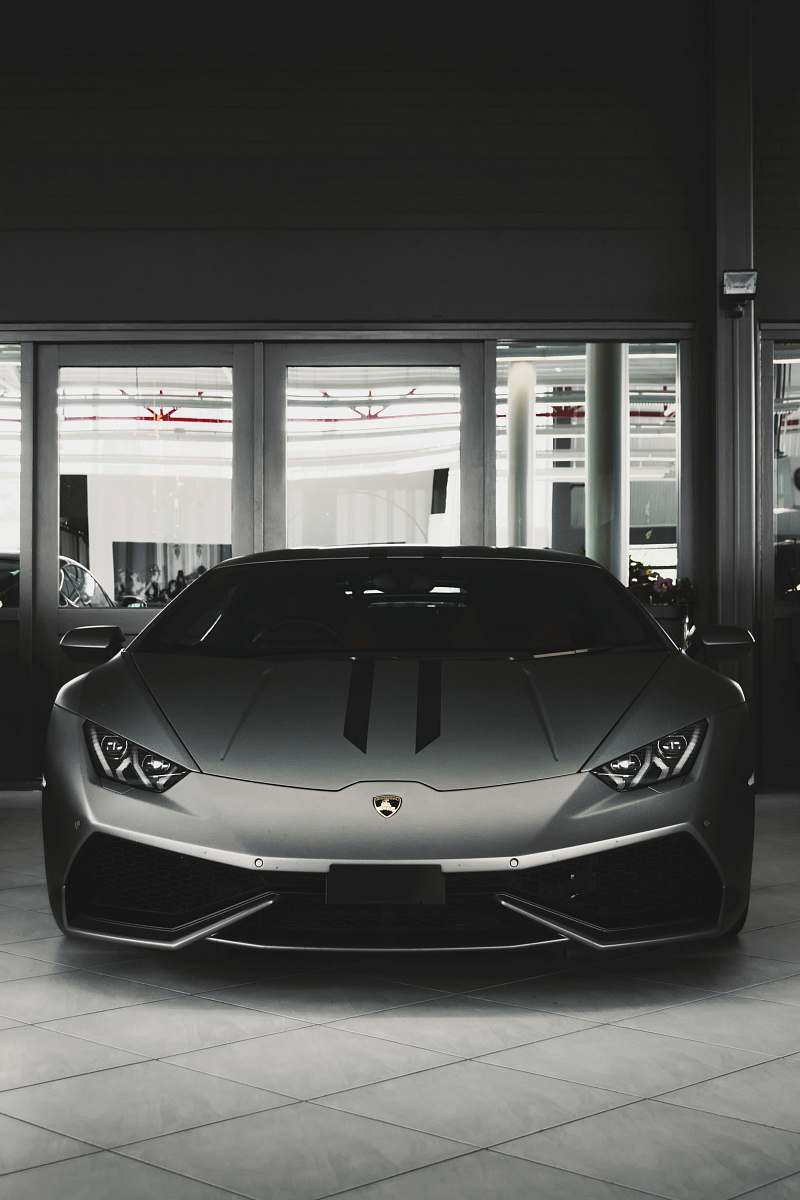 car gray coupe on parking area grey