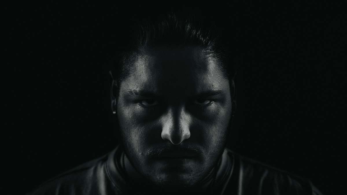 face grayscale portrait photo of man portrait