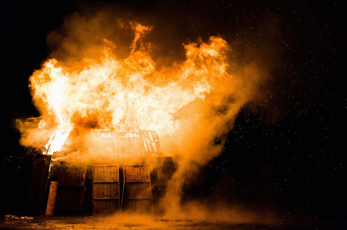 flame photo of burning house smoke