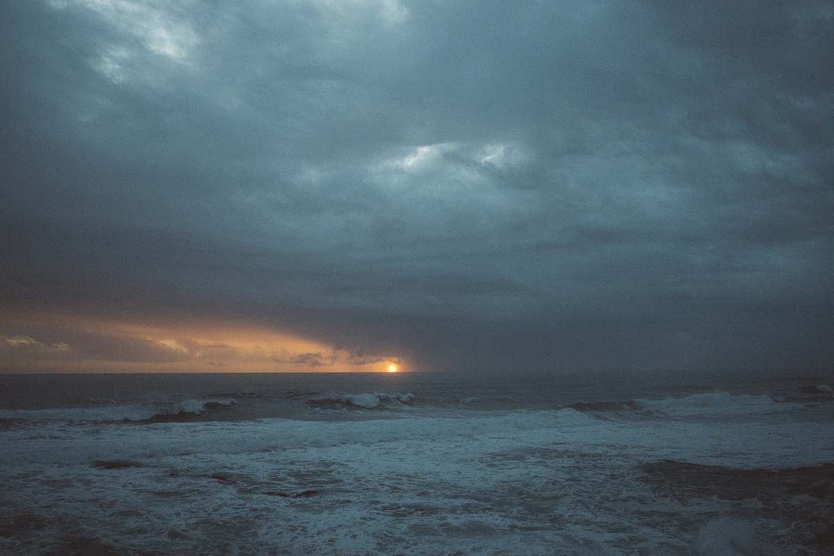 sea photo of landscape during golden hour outdoors