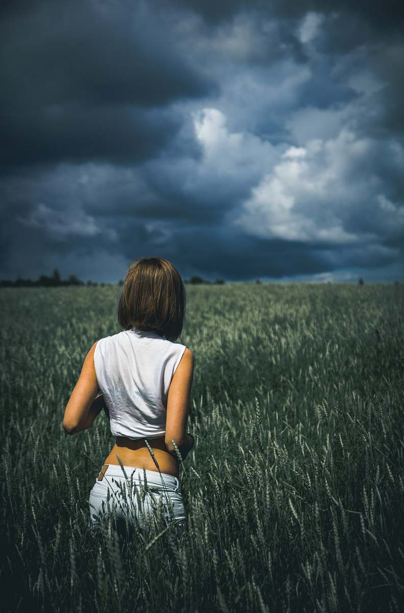 woman woman in sleeveless top on plants field female