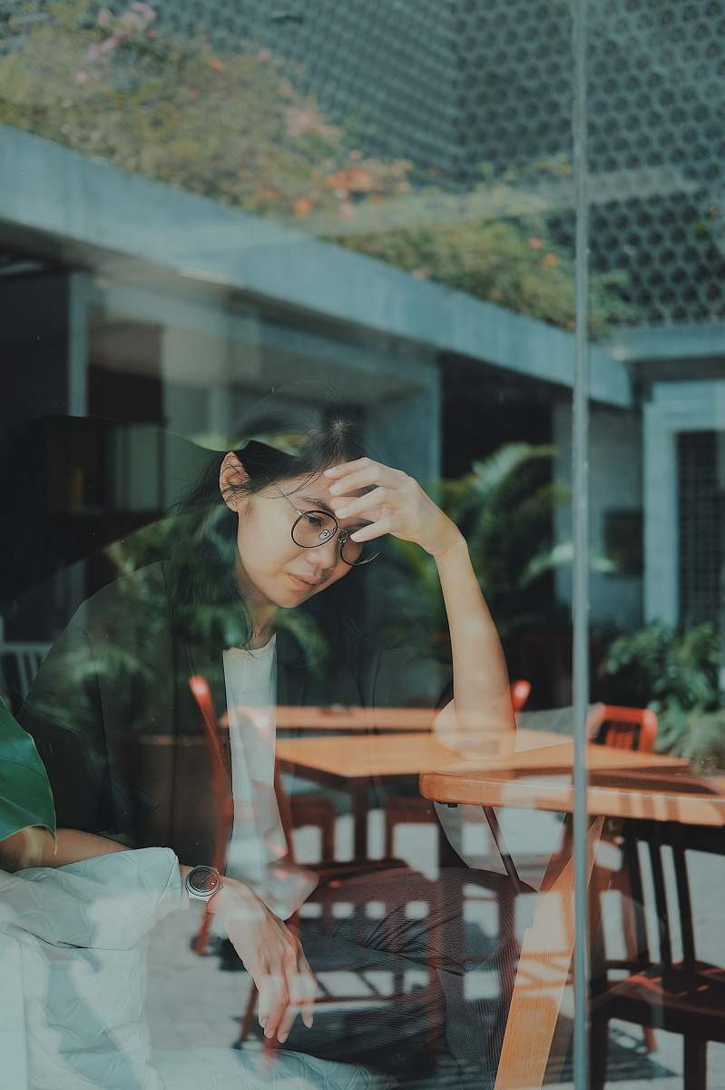 person woman touching her forehead human