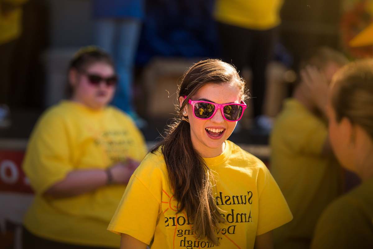 apparel smiling girl wearing pink framed sunglasses clothing