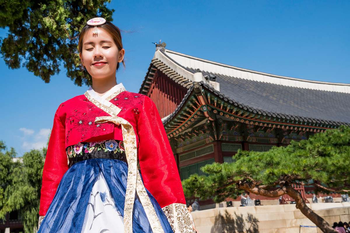 human woman wearing Korean traditional dress people