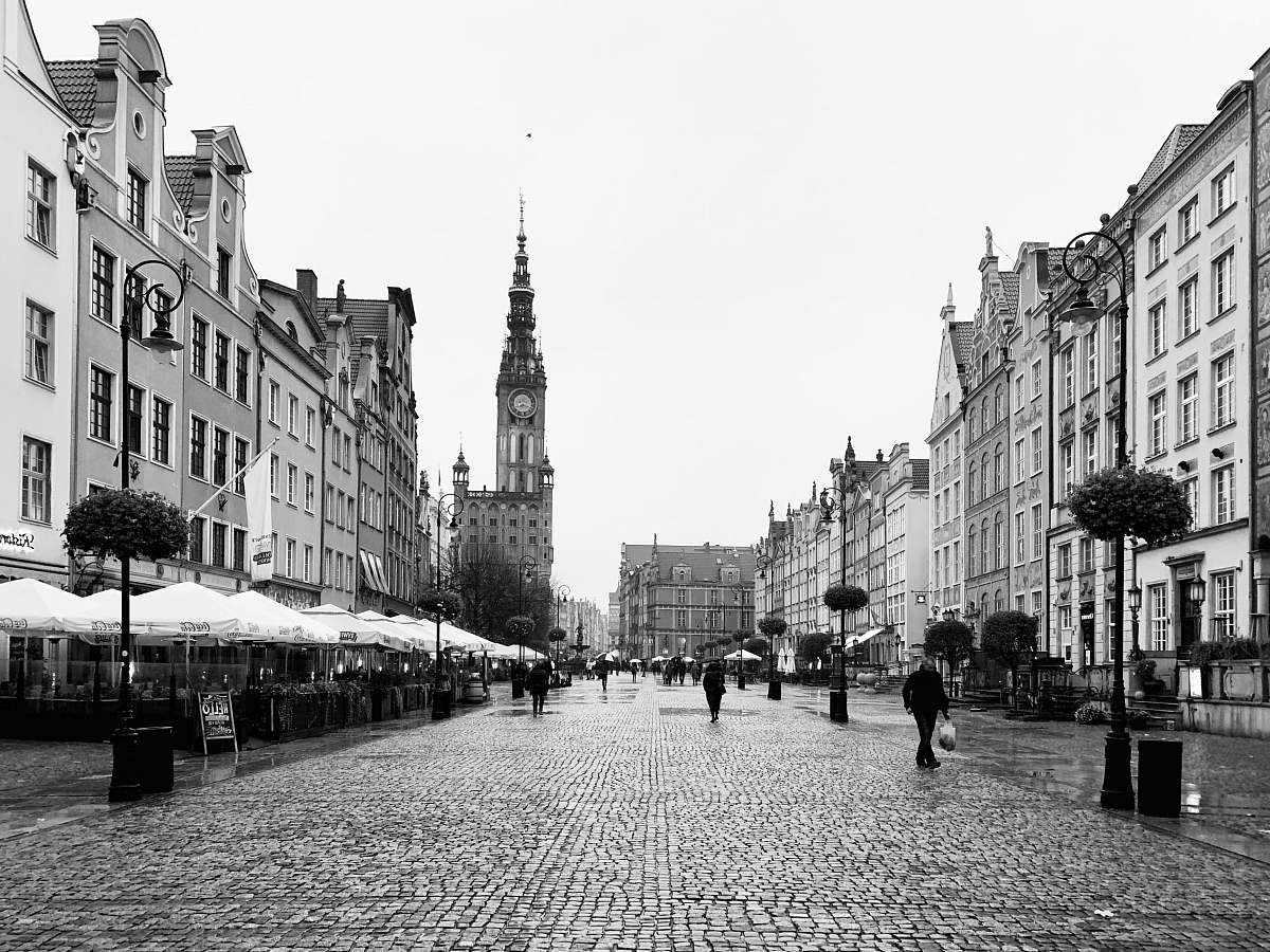 path people walking on street near buildings during daytime walkway