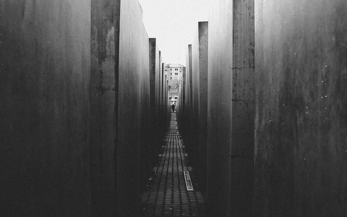 alley grayscale photo of alley corridor
