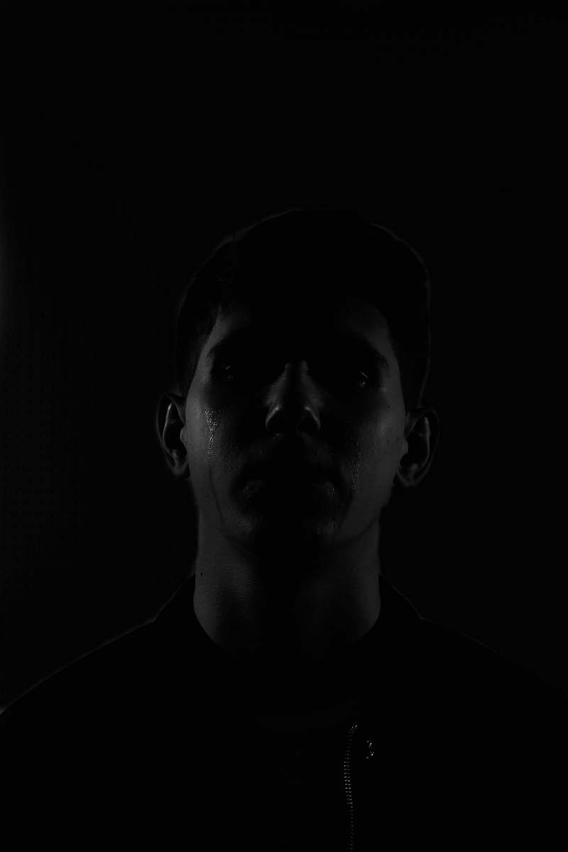 person man in black crew-neck shirt human
