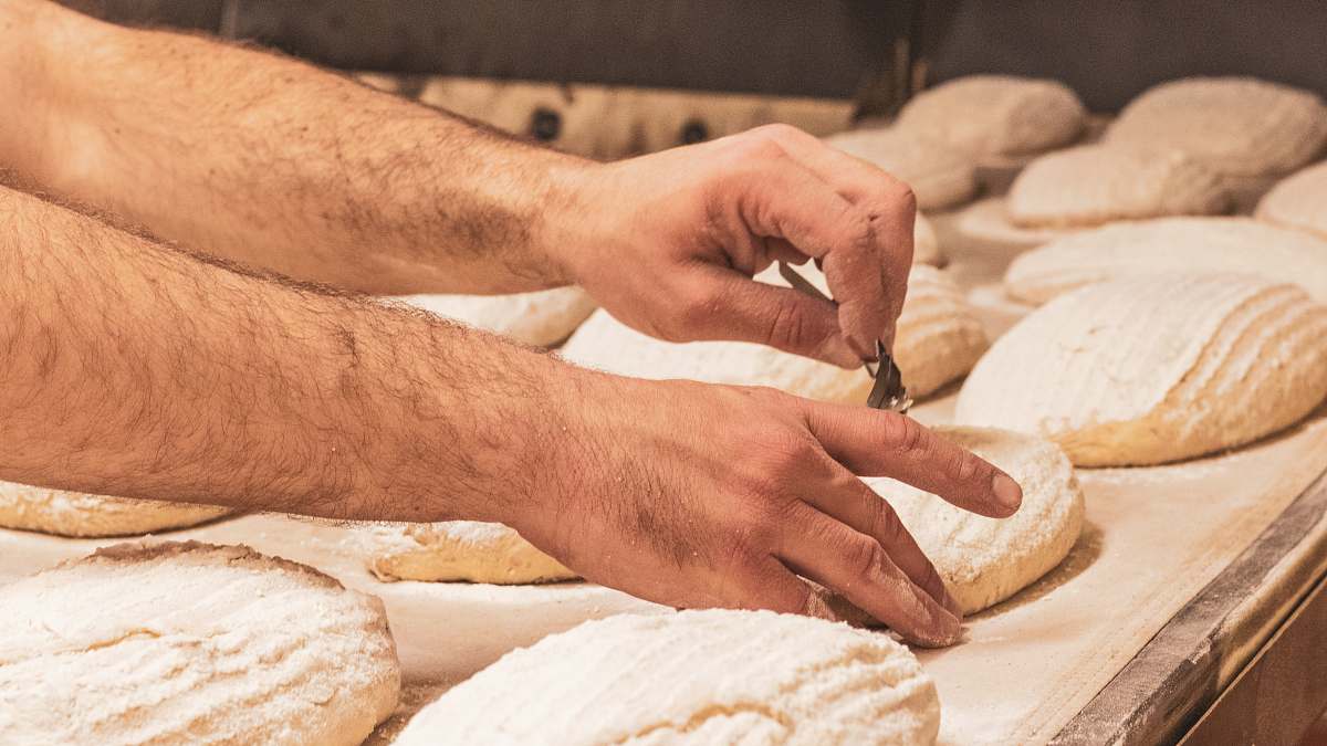 food person baking pastry dough