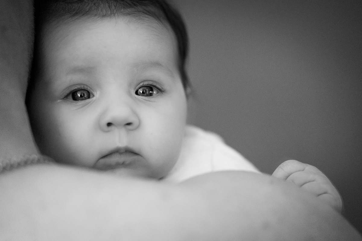 person grayscale portrait photography of baby black-and-white