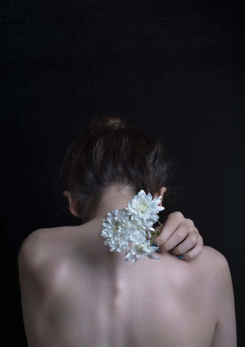 human woman holding flower person
