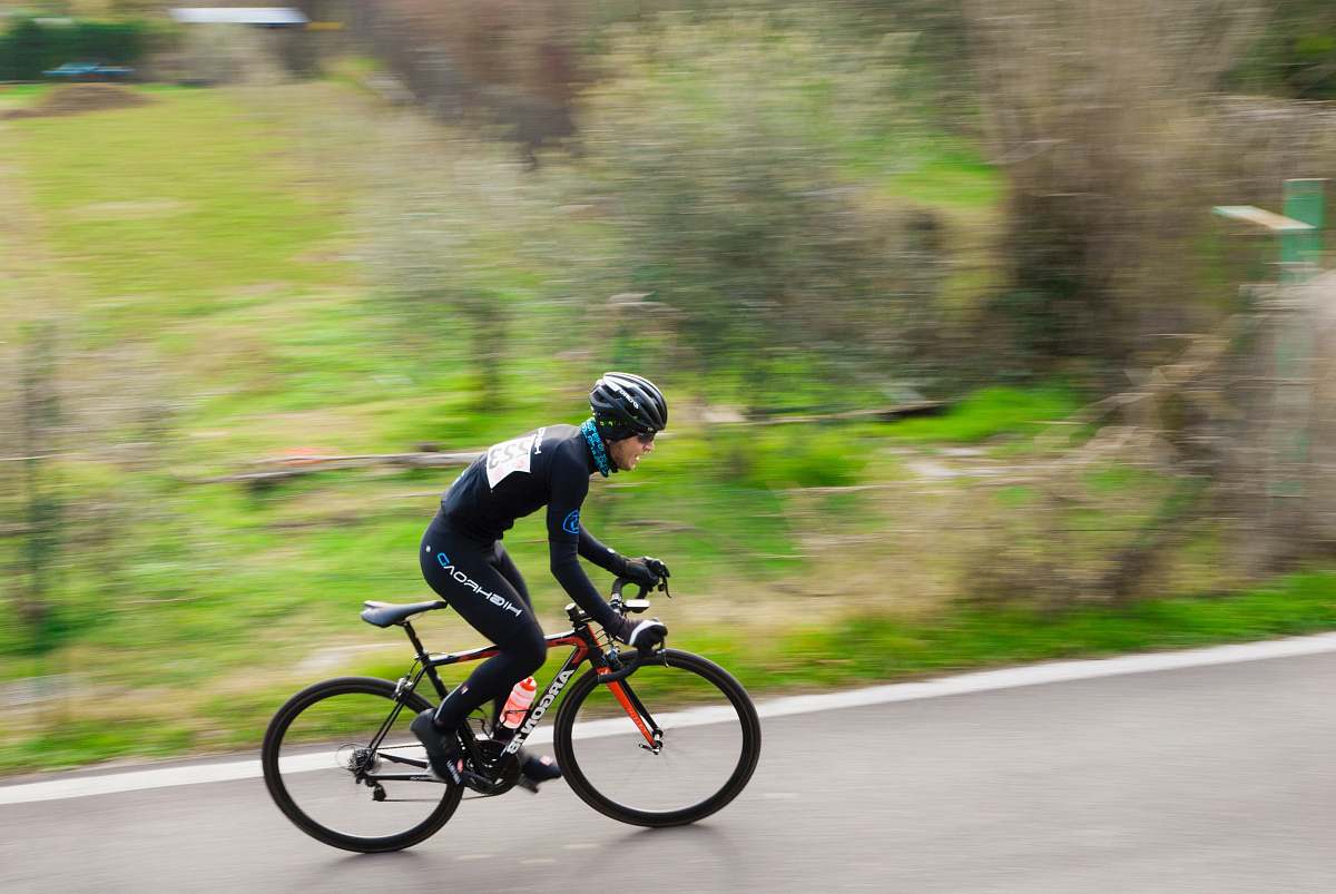 people man riding mountain bicycle during daytime bicycle