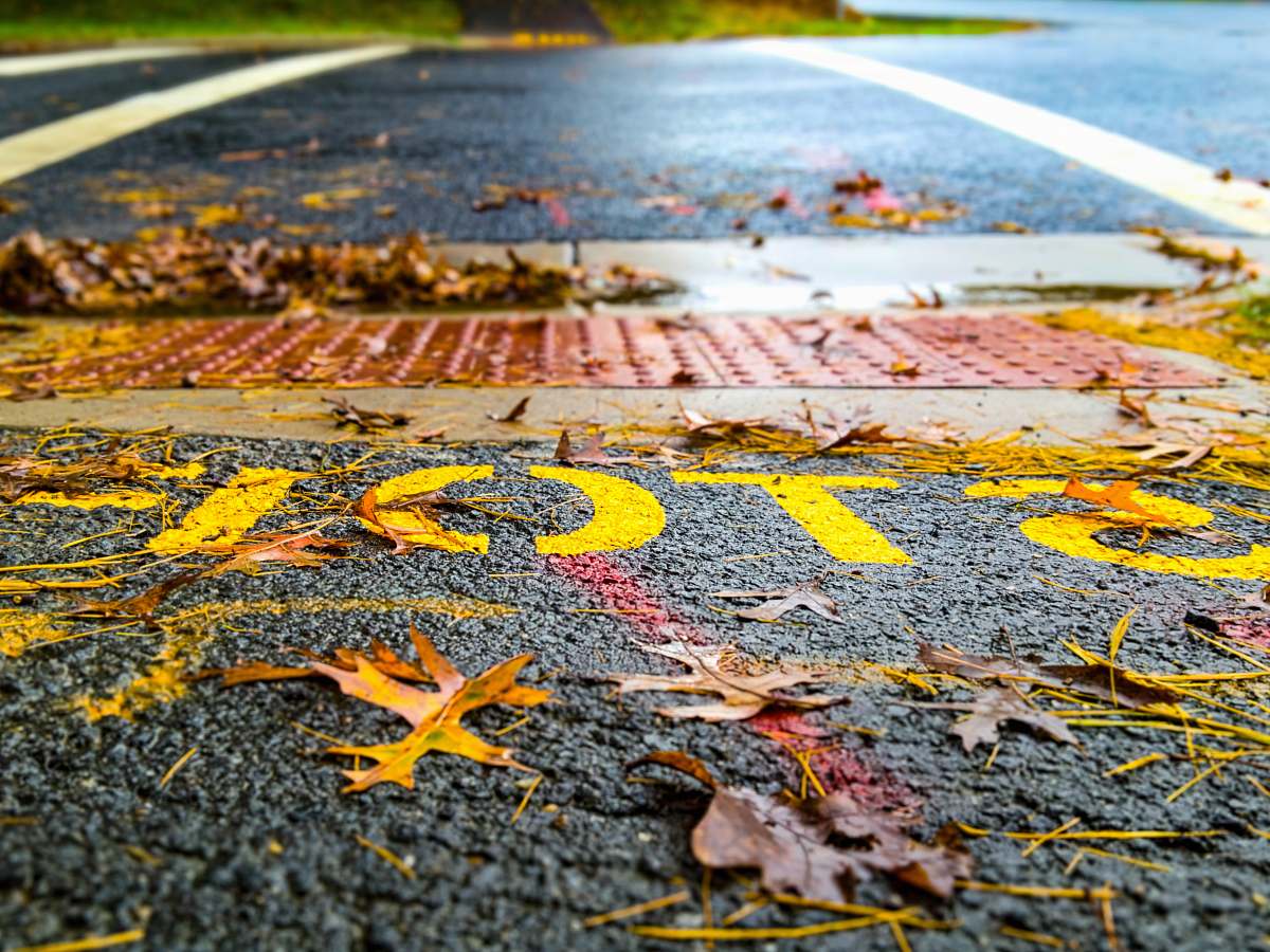 asphalt STOP sign tarmac