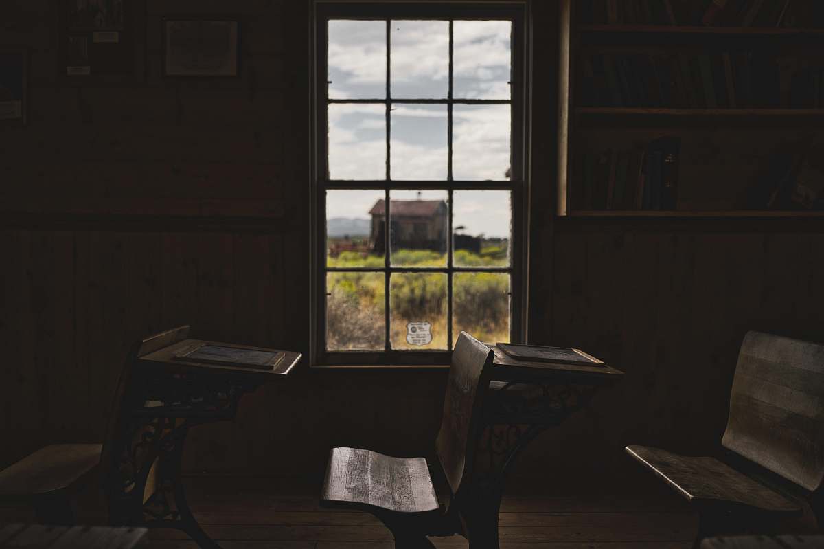 wood brown wooden desks and clear glass window fort rock
