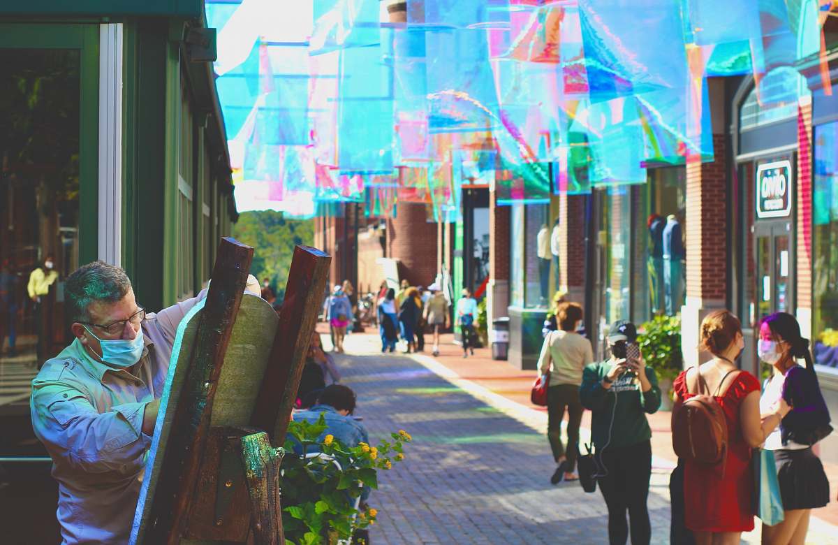 human people walking on sidewalk during daytime pedestrian