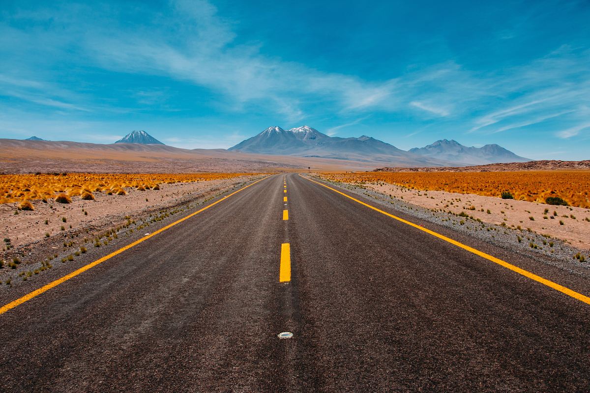 lone road going to mountains