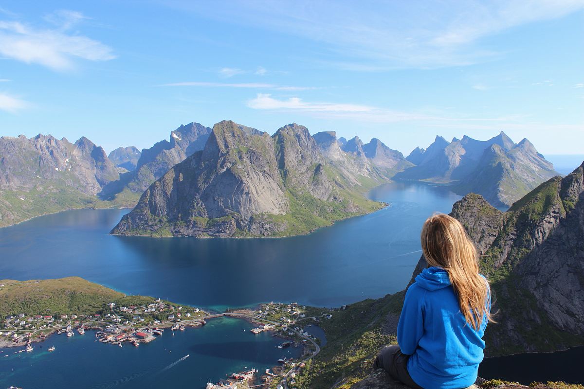 woman sitting on a cliff