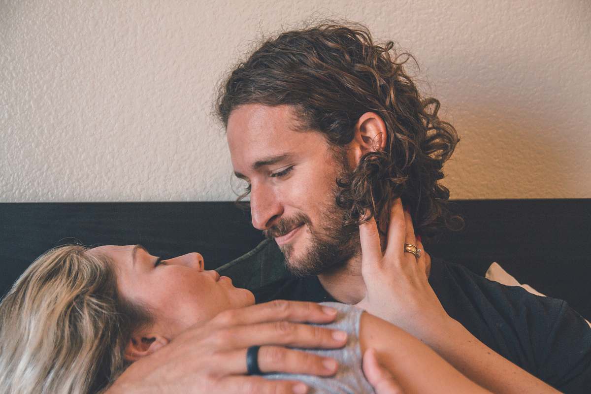 human man holding woman person