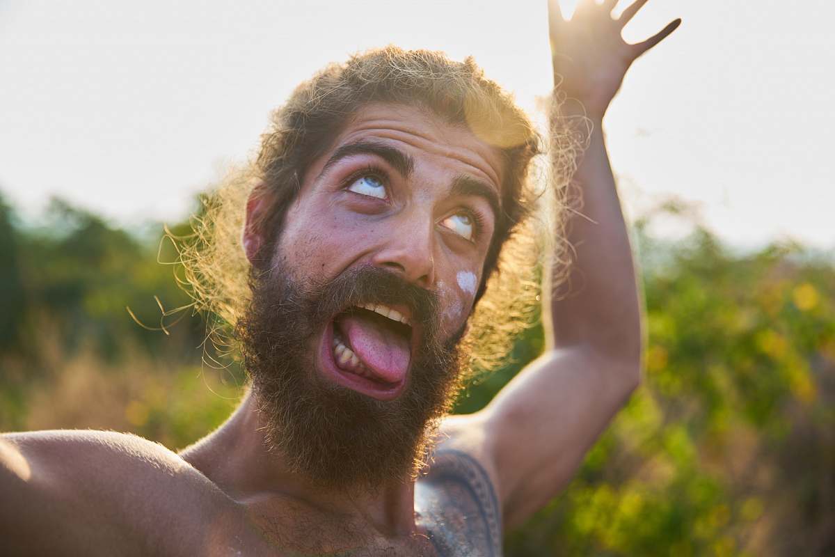 person man sticking his tongue out human