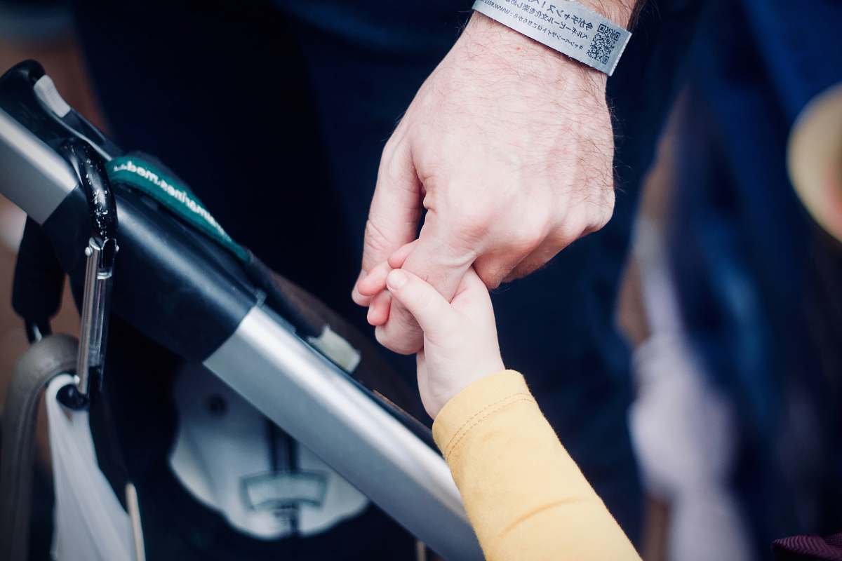 people person holding hands with child human