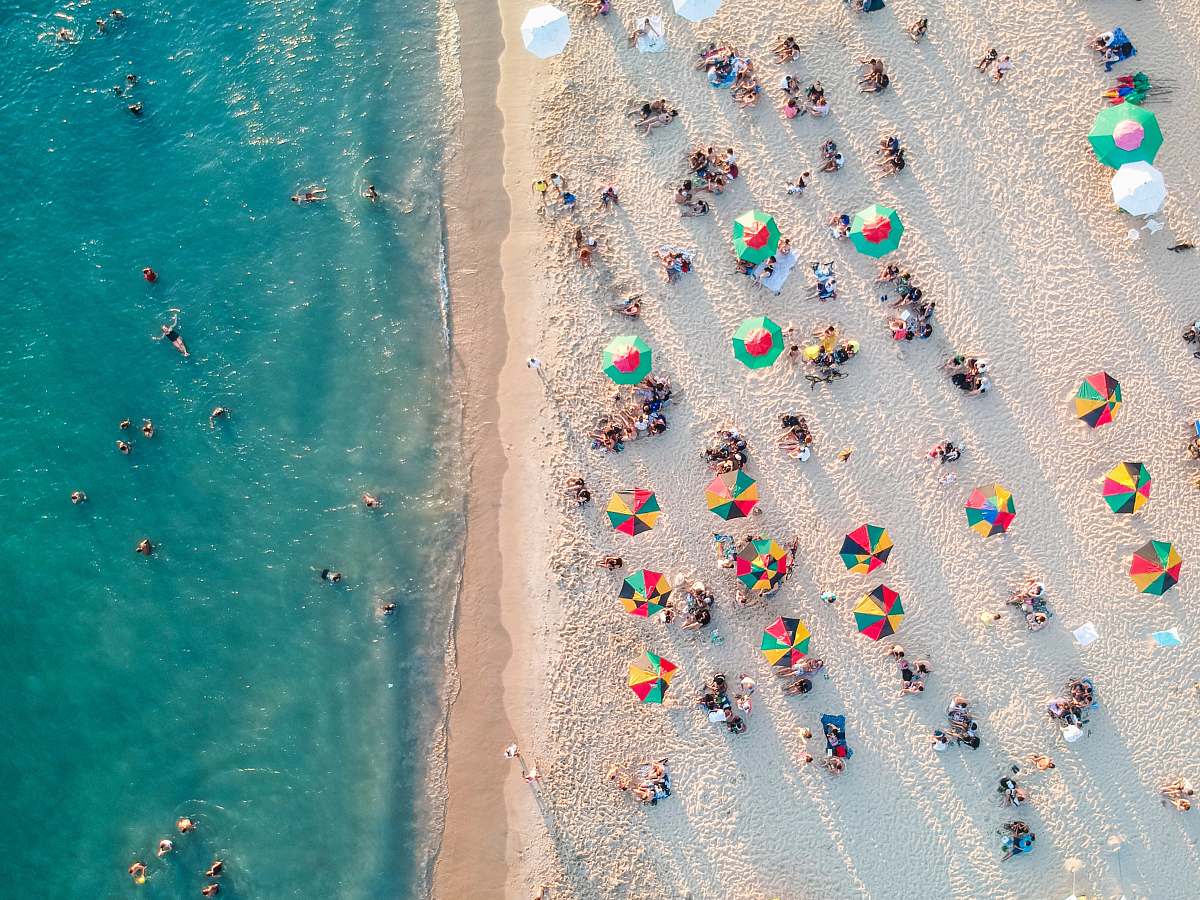 miami bird's eye view photo of people on beach water
