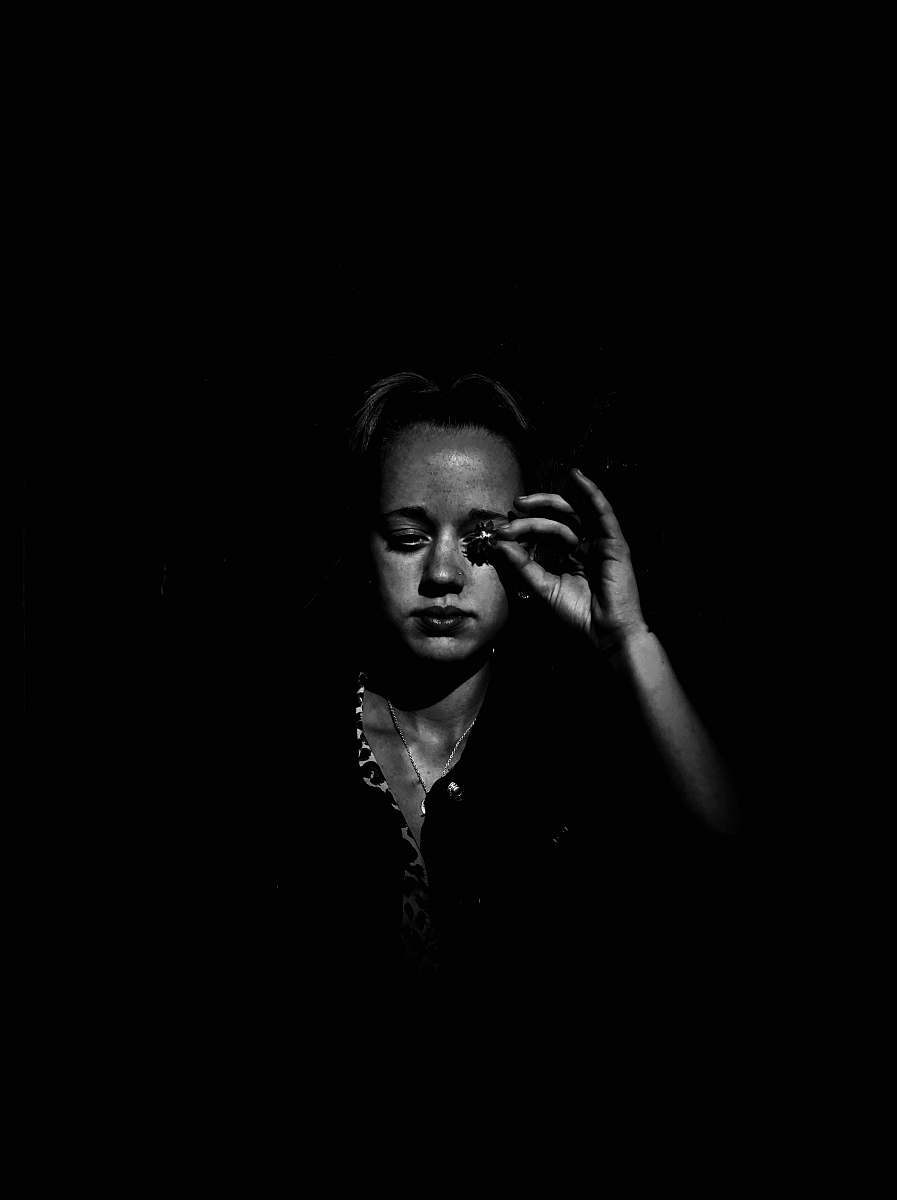 human grayscale photo of woman face