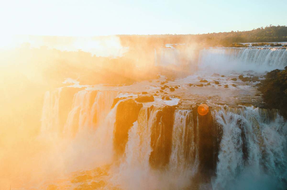 nature waterfalls photo during daytime waterfall