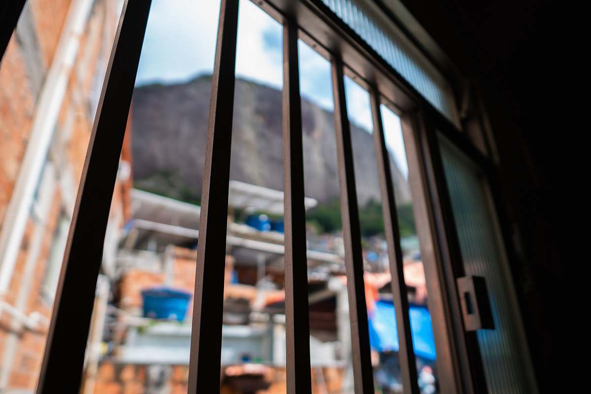 window selective focus photography of brown metal frame rio de janeiro
