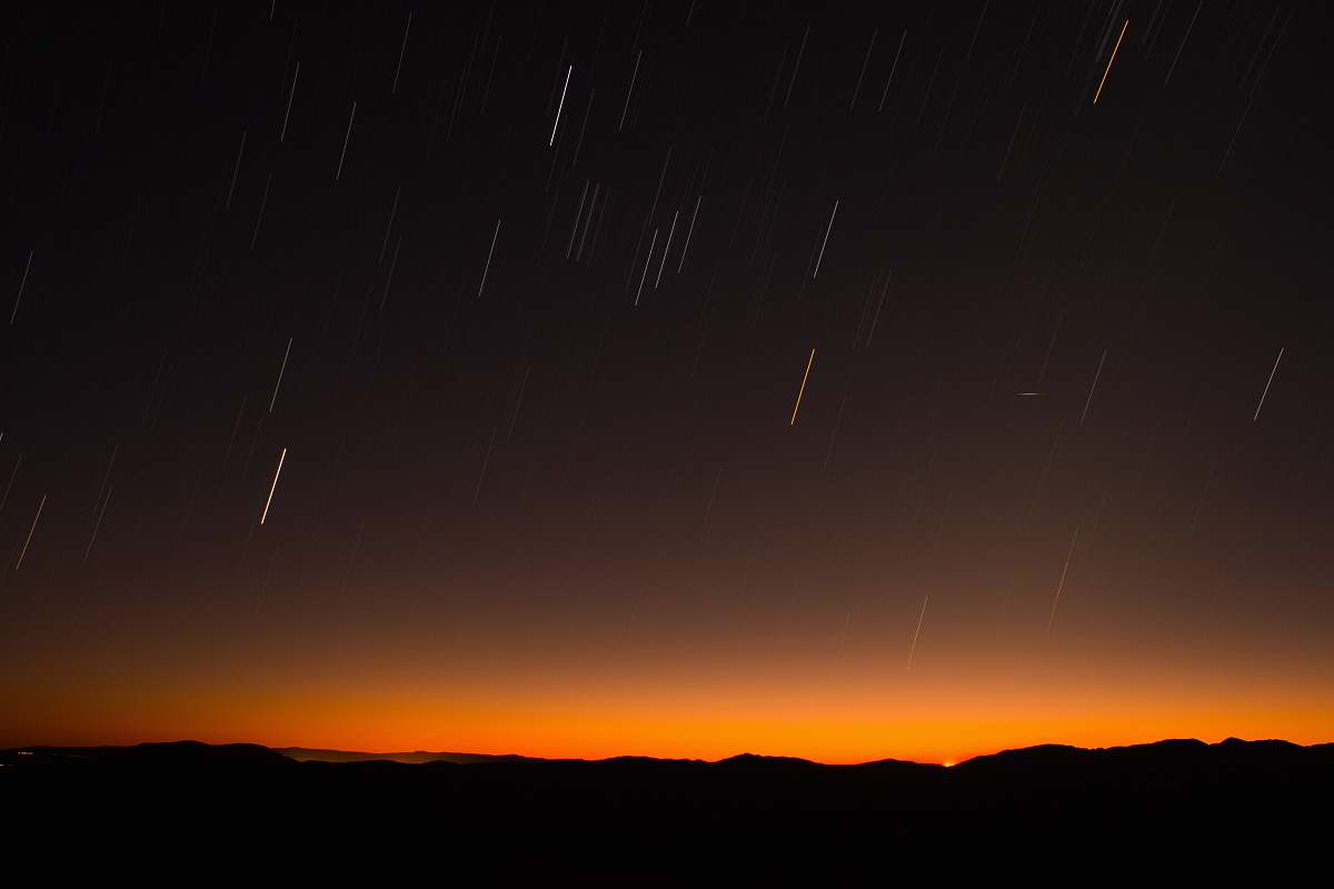 nature silhouette of hill during night time sky