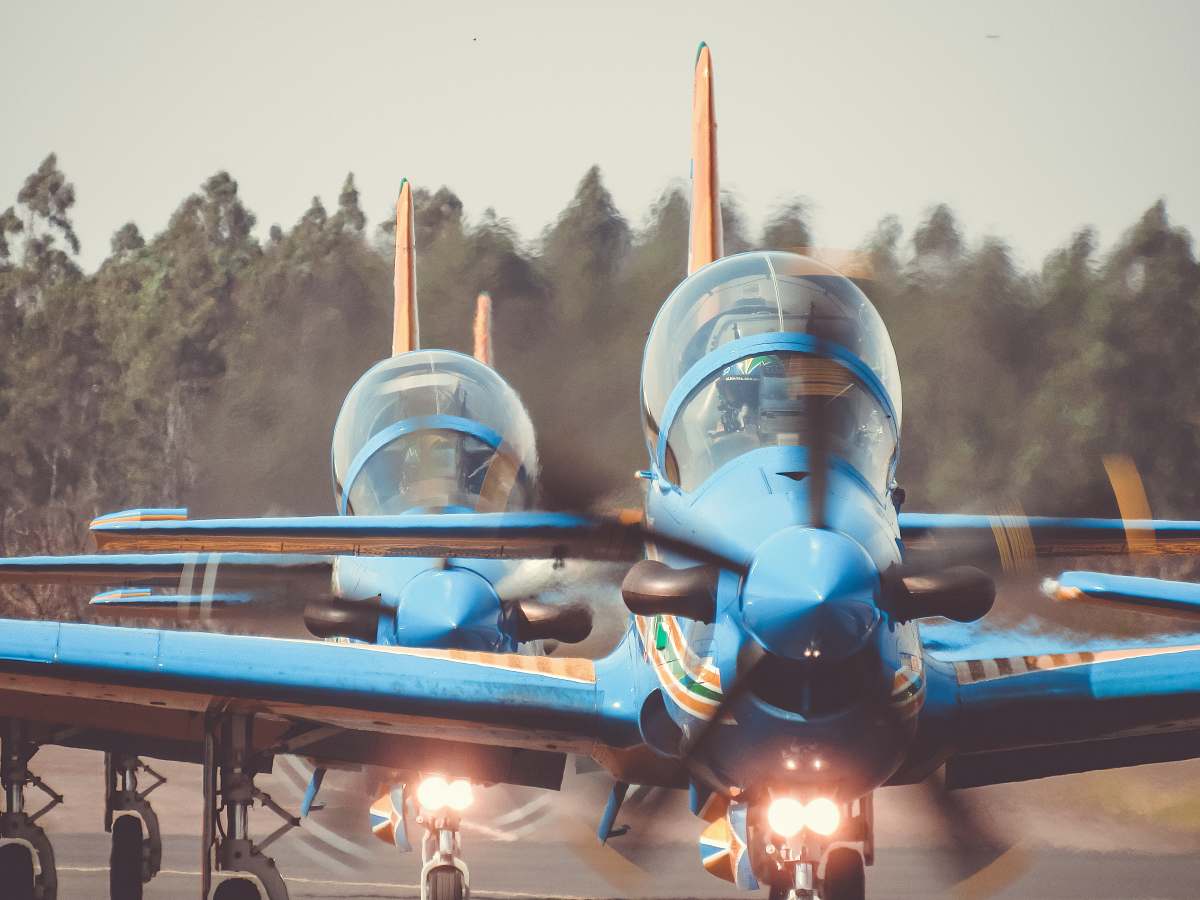 aircraft two blue planes during daytime airplane