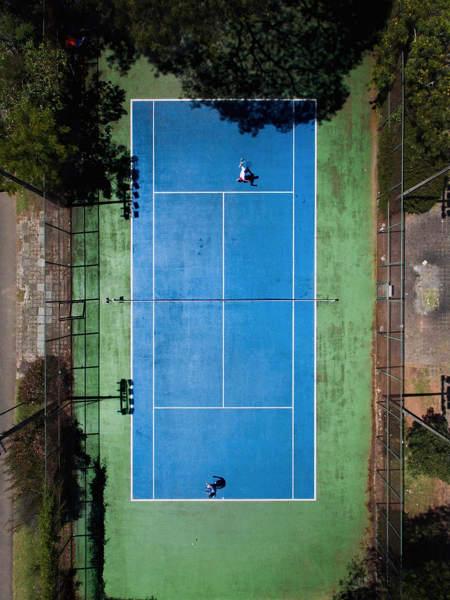blue two men playing tennis curitiba