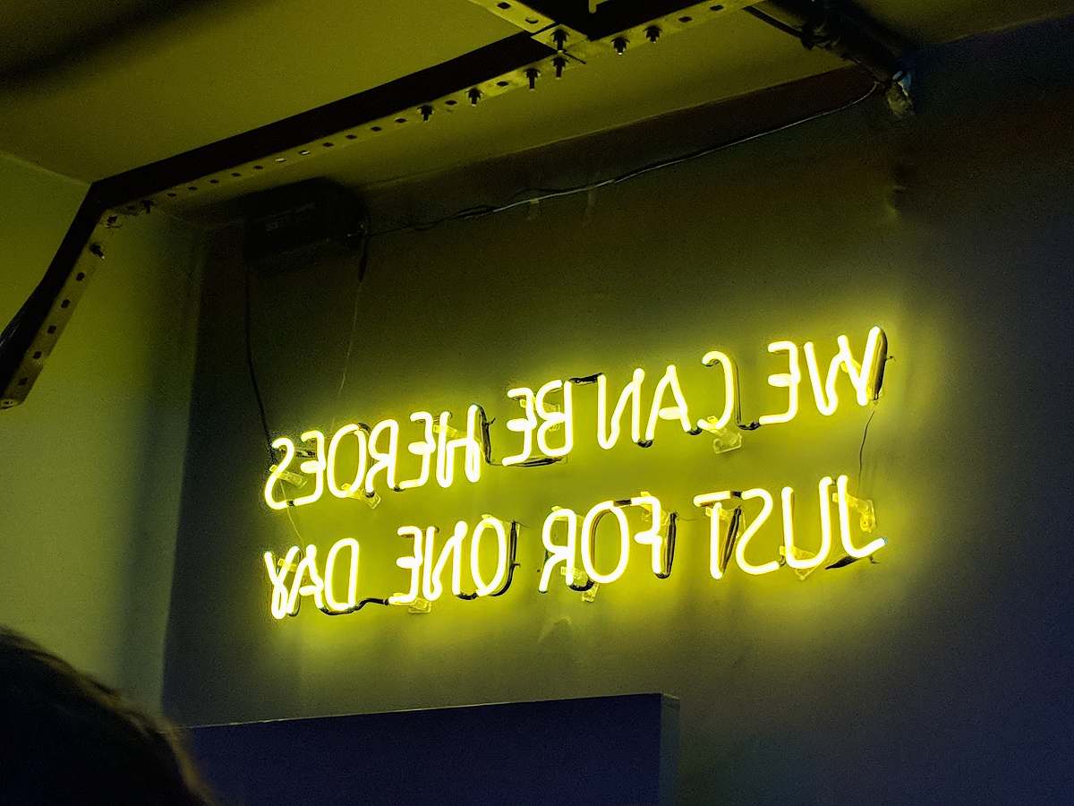 neon yellow neon light signage quote