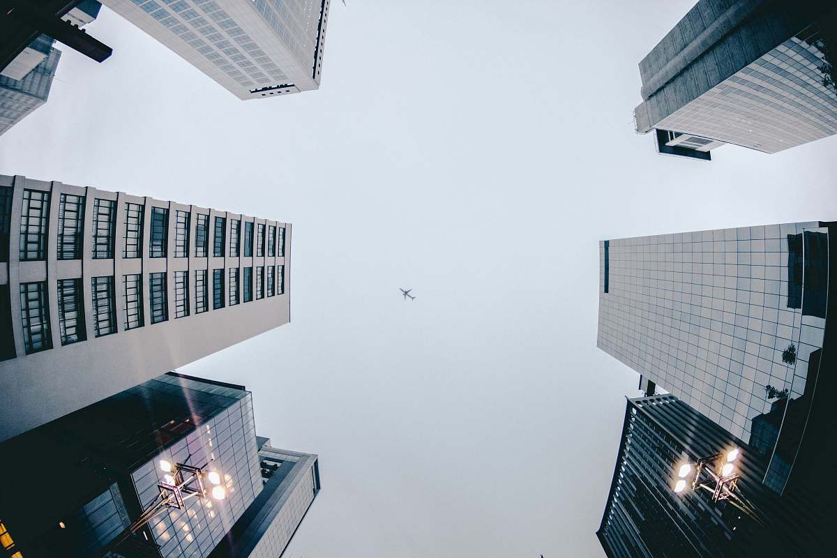 building worm's eyeview photography of concrete building architecture