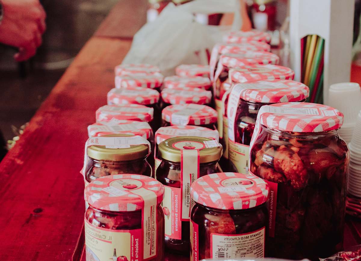 food clear glass jars on brown wooden table human